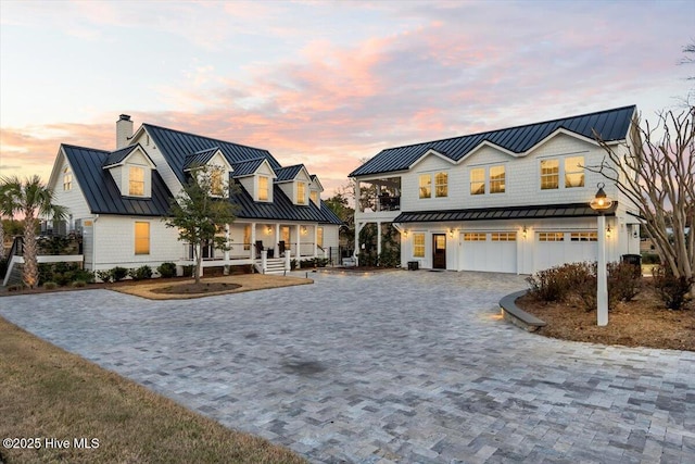7522 Dunbar Rd, Wilmington, NC 28411 - modern inspired farmhouse with a standing seam roof, covered porch, and a metal roof
