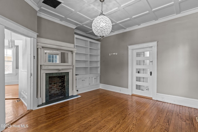 unfurnished living room with an inviting chandelier, coffered ceiling, hardwood / wood-style floors, and visible vents