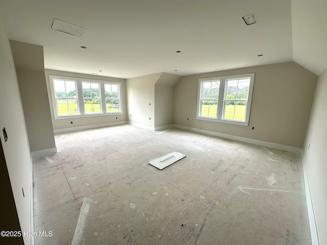110 Blimp View Dr, Elizabeth City, NC 27909 - bonus room with plenty of natural light, baseboards, and lofted ceiling