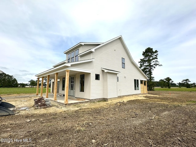 110 Blimp View Dr, Elizabeth City, NC 27909 - view of side of home with a patio and board and batten siding