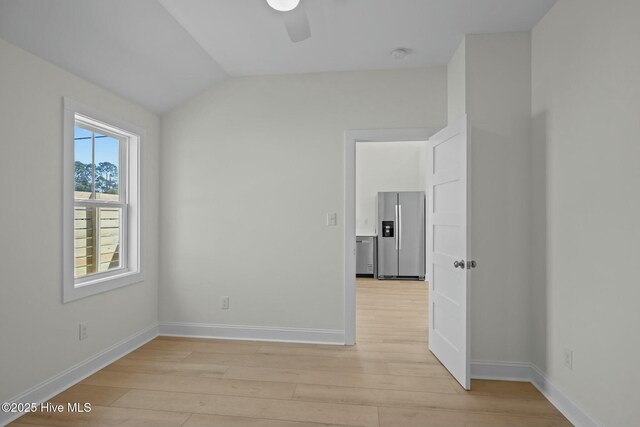 1615 Live Oak St Unit A & B, Beaufort, NC 28516 - spare room with vaulted ceiling, light wood-style floors, baseboards, and ceiling fan