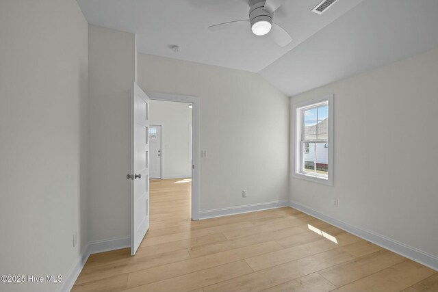 1615 Live Oak St Unit A & B, Beaufort, NC 28516 - spare room with baseboards, visible vents, light wood finished floors, lofted ceiling, and ceiling fan