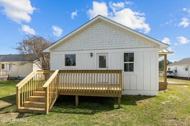 1615 Live Oak St Unit A & B, Beaufort, NC 28516 - back of house with a deck, a lawn, and board and batten siding