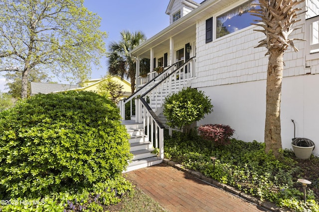 3001 E Yacht Dr, Oak Island, NC 28465 - view of side of home featuring stairs