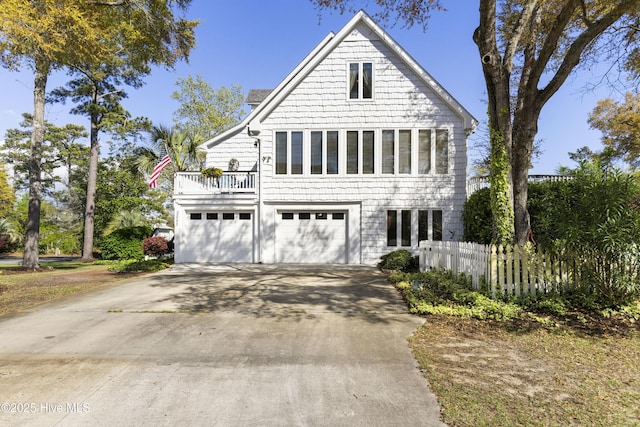 3001 E Yacht Dr, Oak Island, NC 28465 - view of front of property with an attached garage, fence, and driveway