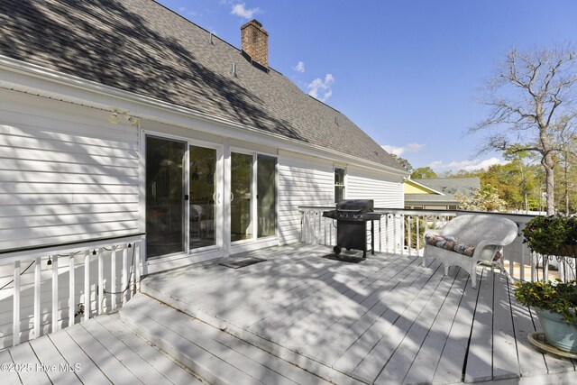 3001 E Yacht Dr, Oak Island, NC 28465 - wooden deck with grilling area