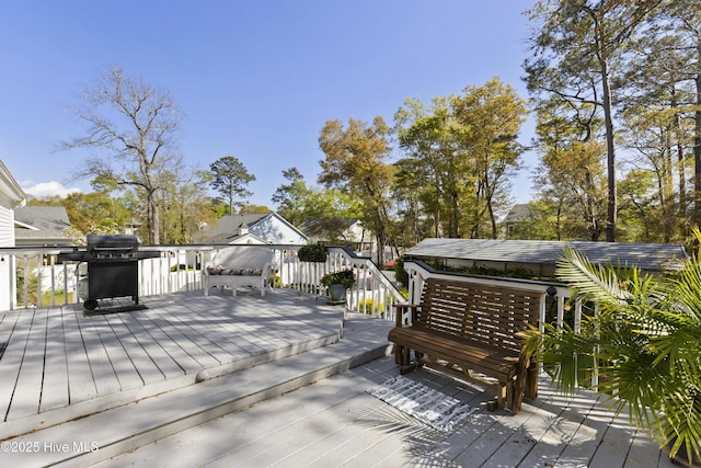 3001 E Yacht Dr, Oak Island, NC 28465 - wooden deck with grilling area