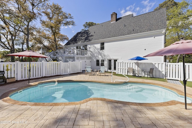 3001 E Yacht Dr, Oak Island, NC 28465 - view of swimming pool with a fenced backyard, a fenced in pool, and a patio
