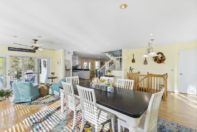 3001 E Yacht Dr, Oak Island, NC 28465 - dining space featuring ceiling fan, recessed lighting, stairway, light wood finished floors, and baseboards