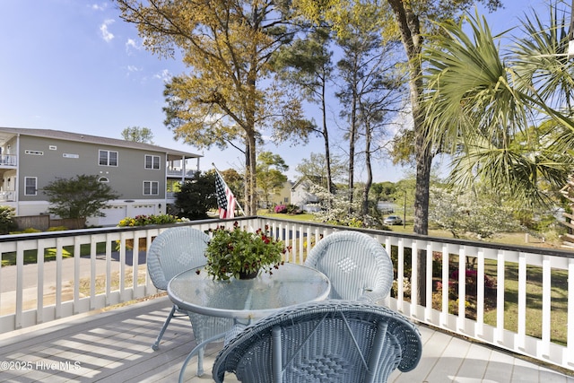 3001 E Yacht Dr, Oak Island, NC 28465 - deck with outdoor dining space