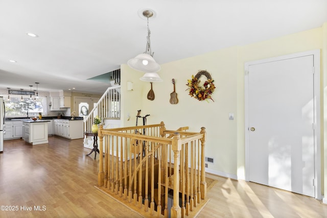 3001 E Yacht Dr, Oak Island, NC 28465 - dining area featuring visible vents, light wood finished floors, and recessed lighting