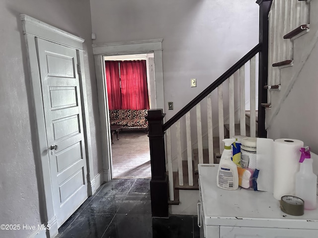 foyer featuring stairs