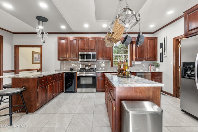 kitchen featuring light tile patterned flooring, a peninsula, ornamental molding, wine cooler, and appliances with stainless steel finishes