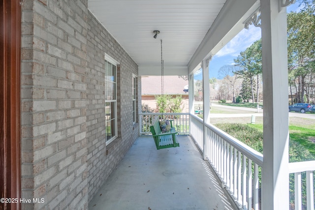 balcony featuring covered porch