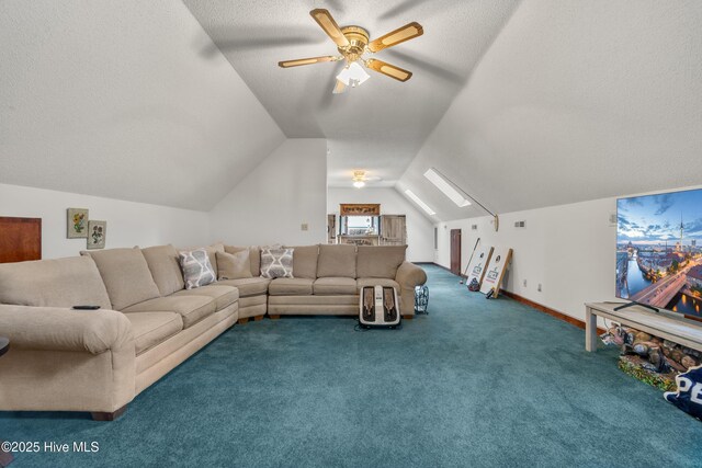 living room featuring lofted ceiling, a textured ceiling, a ceiling fan, and carpet flooring
