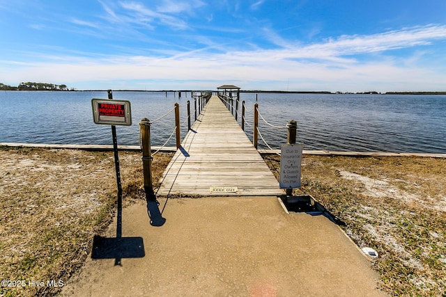dock area featuring a water view