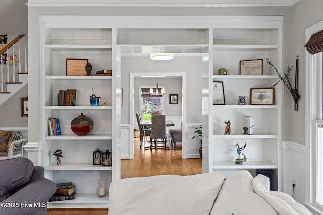 bedroom featuring wood finished floors