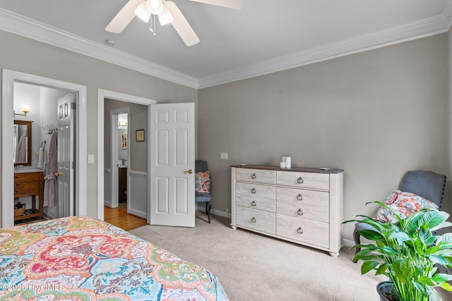 bedroom featuring crown molding, a ceiling fan, and carpet
