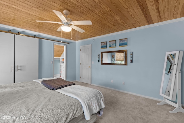 carpeted bedroom featuring crown molding, ceiling fan, a barn door, wood ceiling, and baseboards