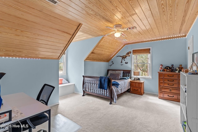 carpeted bedroom featuring wooden ceiling, ceiling fan, baseboards, and vaulted ceiling