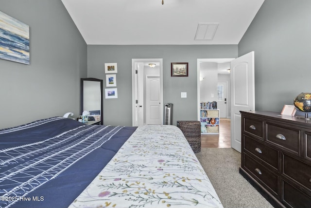 bedroom featuring carpet floors and visible vents