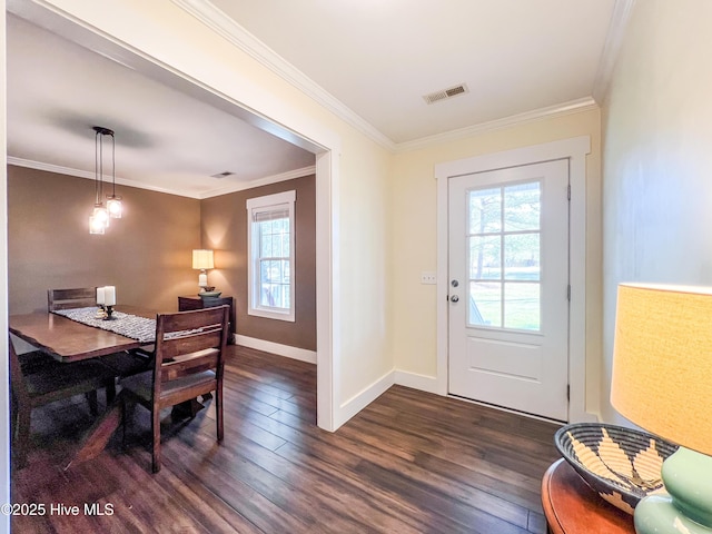 393 Knollwood Dr, Hampstead, NC 28443 - entryway featuring dark wood finished floors, crown molding, and baseboards