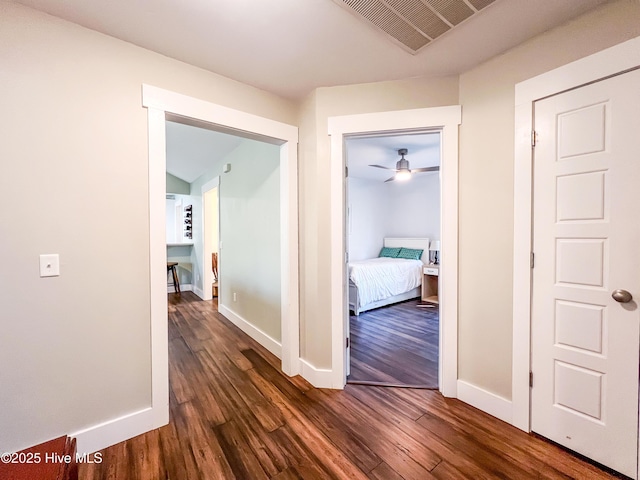 393 Knollwood Dr, Hampstead, NC 28443 - hall featuring dark wood-style floors and baseboards