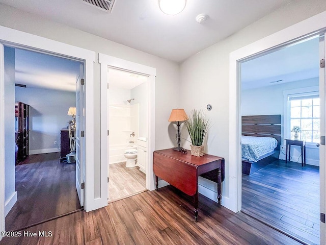 393 Knollwood Dr, Hampstead, NC 28443 - hall with wood finished floors and baseboards
