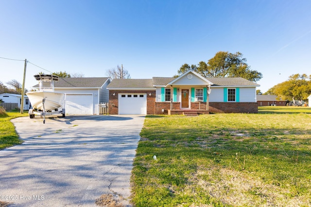 ranch-style house featuring brick siding, driveway, a garage, and a front lawn