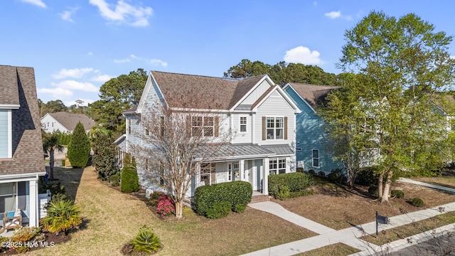 1025 Anchors Bend Way, Wilmington, NC 28411 - view of front of property with a standing seam roof, covered porch, metal roof, and roof with shingles