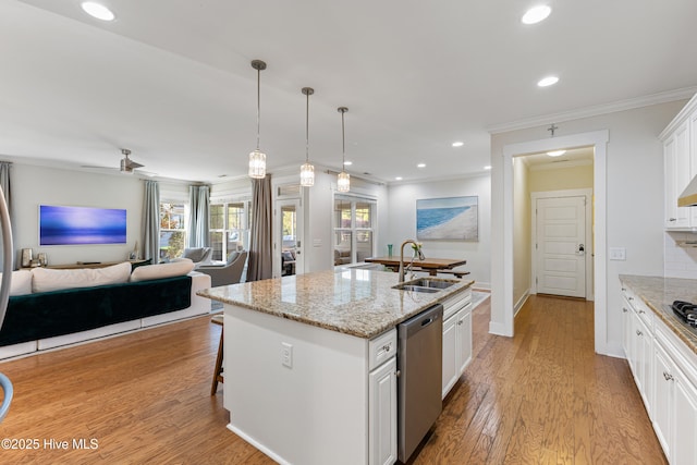 1025 Anchors Bend Way, Wilmington, NC 28411 - kitchen with dishwasher, a sink, open floor plan, crown molding, and white cabinetry