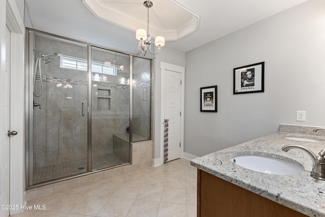 1025 Anchors Bend Way, Wilmington, NC 28411 - full bath featuring a stall shower, double vanity, tile patterned floors, baseboards, and a chandelier
