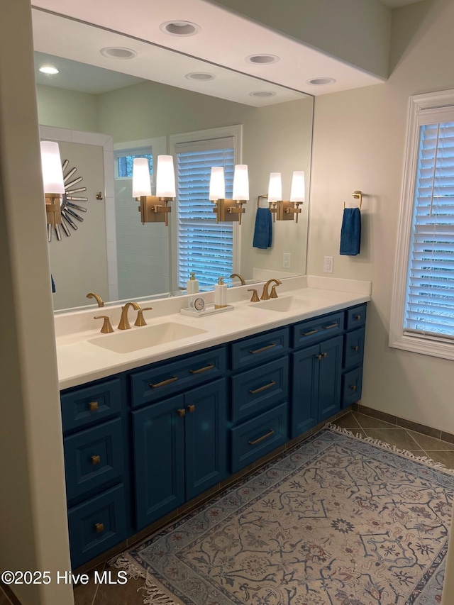1325 Grandiflora Dr, Leland, NC 28451 - full bathroom featuring a sink, a healthy amount of sunlight, and tile patterned flooring
