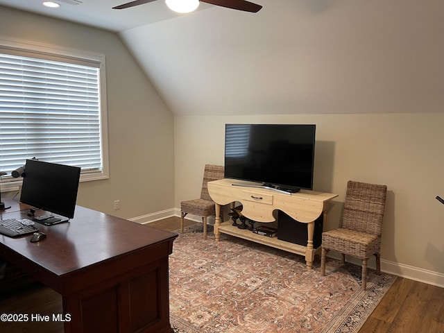 1325 Grandiflora Dr, Leland, NC 28451 - home office with baseboards, wood finished floors, vaulted ceiling, and a ceiling fan