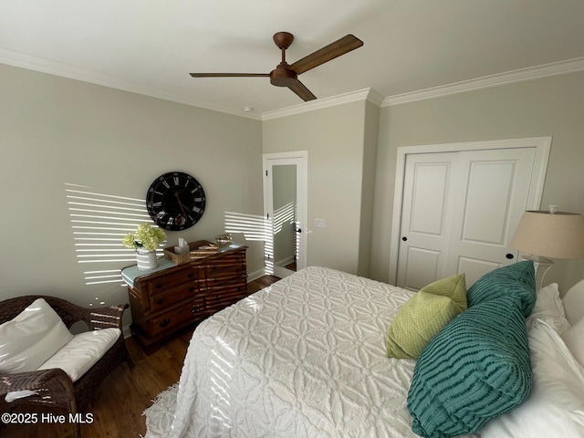 1325 Grandiflora Dr, Leland, NC 28451 - bedroom featuring a closet, ceiling fan, wood finished floors, and crown molding