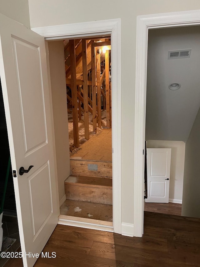 1325 Grandiflora Dr, Leland, NC 28451 - stairway with wood finished floors, baseboards, and visible vents