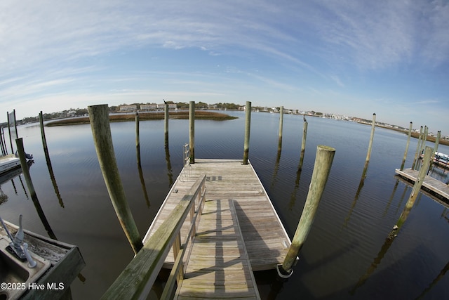 view of dock with a water view