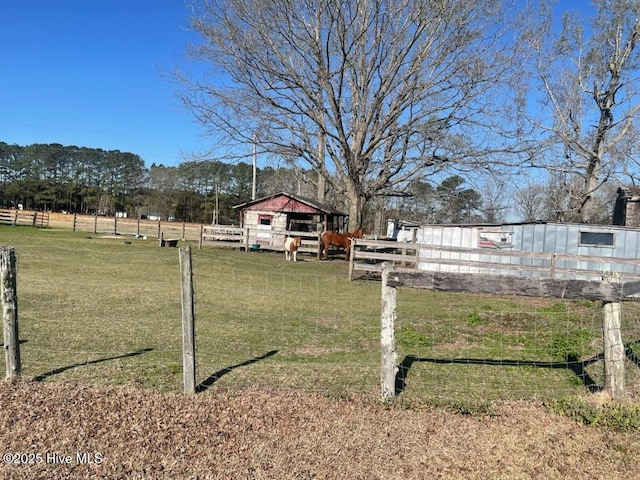 5635 Mckendree Church Rd, Tarboro, NC 27886 - view of yard with a rural view, an outdoor structure, and fence