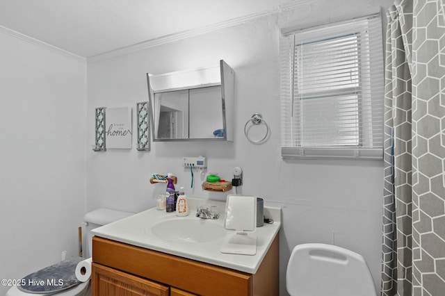 5635 Mckendree Church Rd, Tarboro, NC 27886 - full bath featuring a shower with shower curtain, vanity, ornamental molding, and toilet