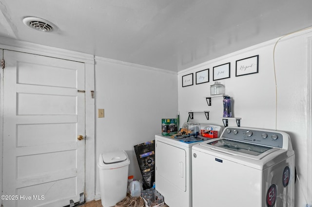 5635 Mckendree Church Rd, Tarboro, NC 27886 - laundry room with washer and dryer, visible vents, and laundry area