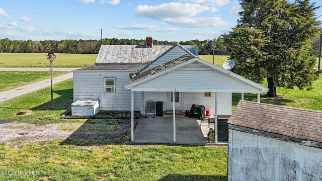 5635 Mckendree Church Rd, Tarboro, NC 27886 - back of house featuring a patio area and a lawn