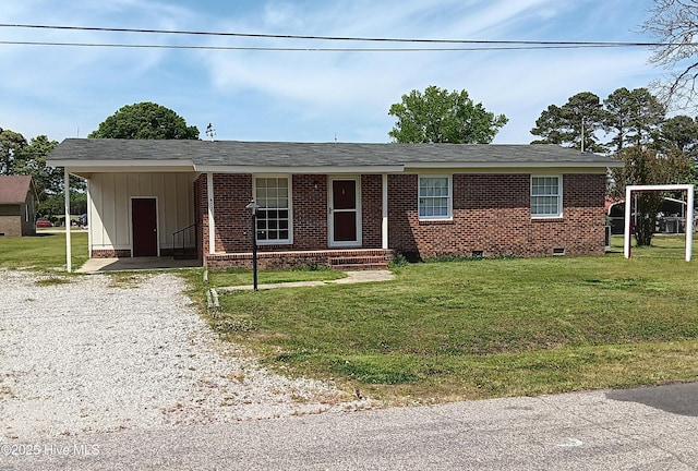 407 Pineview St, Lucama, NC 27851 - single story home with board and batten siding, crawl space, driveway, and a front yard