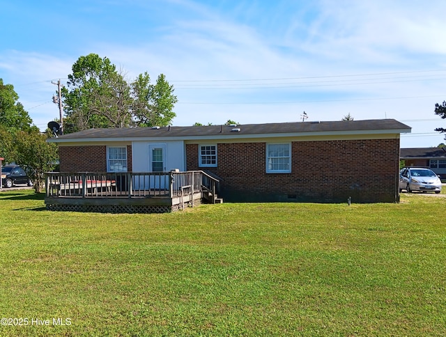 407 Pineview St, Lucama, NC 27851 - back of property featuring a wooden deck, a yard, brick siding, and crawl space