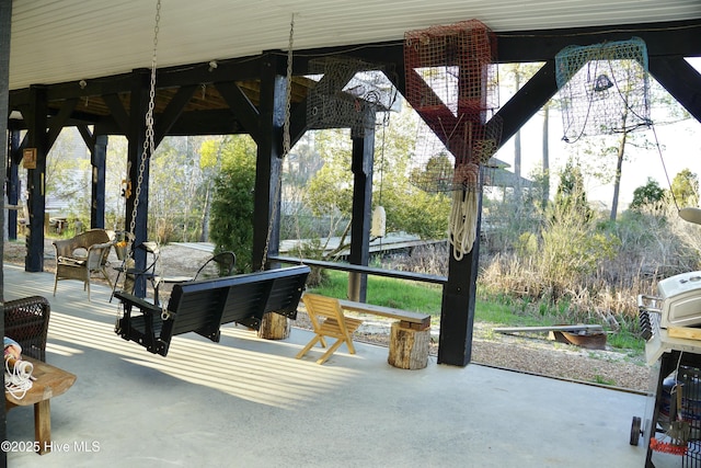 sunroom / solarium featuring plenty of natural light