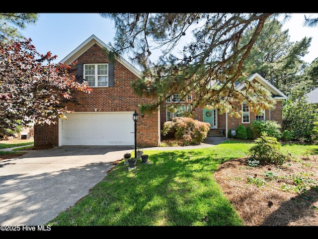 4404 Gauntlet Dr SE, Southport, NC 28461 - traditional-style home with an attached garage, driveway, a front yard, and brick siding