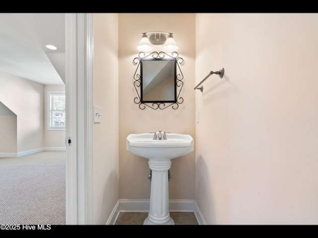 4404 Gauntlet Dr SE, Southport, NC 28461 - bathroom with baseboards