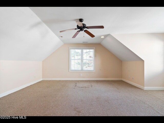 4404 Gauntlet Dr SE, Southport, NC 28461 - bonus room featuring carpet floors, lofted ceiling, and baseboards