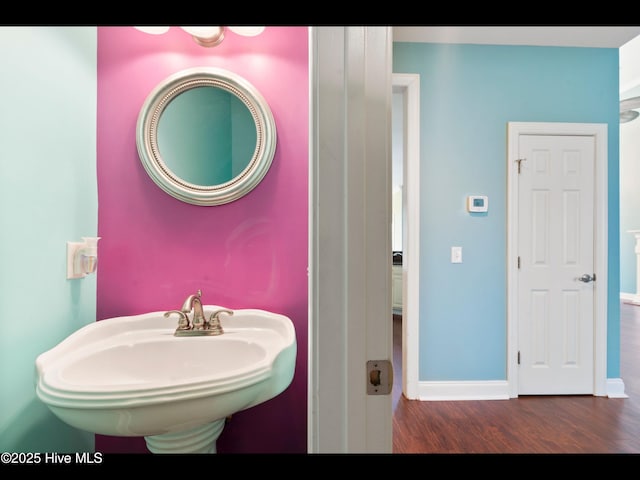 4404 Gauntlet Dr SE, Southport, NC 28461 - bathroom with wood finished floors and baseboards