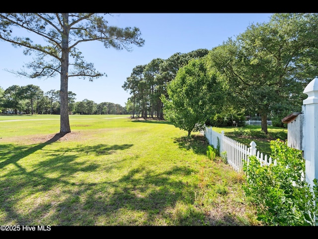 4404 Gauntlet Dr SE, Southport, NC 28461 - view of yard featuring view of scattered trees