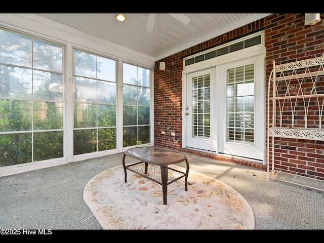 4404 Gauntlet Dr SE, Southport, NC 28461 - unfurnished sunroom with a ceiling fan and plenty of natural light